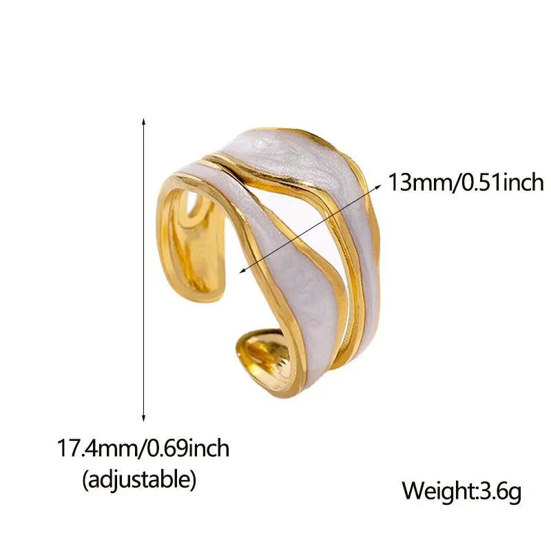Gold and white ring with measurements on a white background