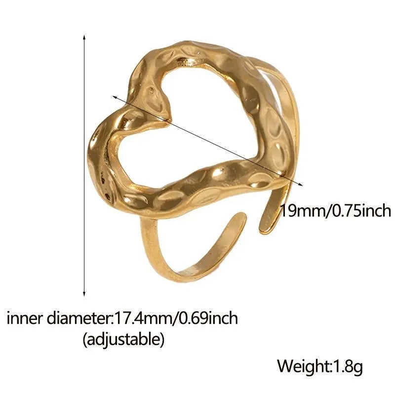 Gold ring with measurements and weight details on a white background