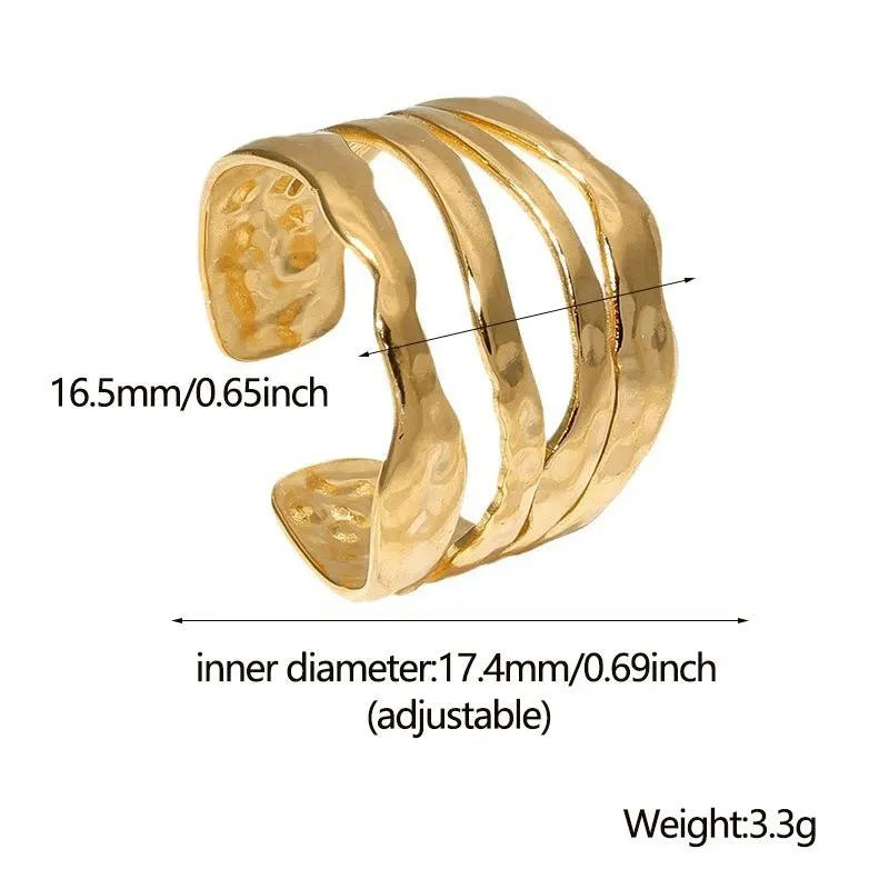 Gold ring with measurements and weight details on a white background